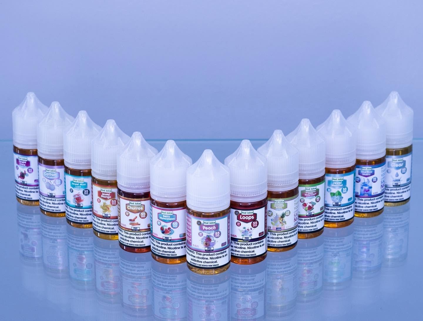 Freebase and nicotine salt e-liquid bottles side by side at Vape Vibes Salem NH